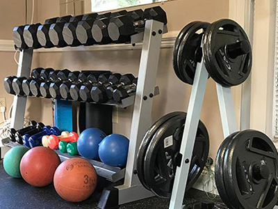 Weights in the 鶹رBaldwin County Fitness Center.
